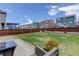 Spacious backyard featuring a well-maintained lawn, privacy fence, and a cozy outdoor seating area at 1246 Blackhaw St, Elizabeth, CO 80107