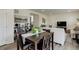 Open living room and dining area with modern furniture and decor at 1246 Blackhaw St, Elizabeth, CO 80107