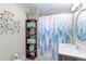 Clean bathroom with shower/tub combo and modern vanity at 103 S Park Ave, Fort Lupton, CO 80621