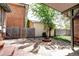 Landscaped backyard with patio and fire pit area at 471 N Humboldt St, Denver, CO 80218