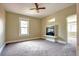 Bright bedroom with carpet flooring, built-in shelving, and a window at 471 N Humboldt St, Denver, CO 80218