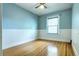 Charming bedroom with hardwood floors and wainscoting at 471 N Humboldt St, Denver, CO 80218