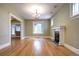 Living room featuring hardwood floors, fireplace, and large windows at 471 N Humboldt St, Denver, CO 80218