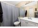 Bathroom with shower/tub combo and vanity at 4400 S Quebec St # 204N, Denver, CO 80237