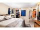 Bright bedroom with a queen-size bed and ample closet space at 4400 S Quebec St # 204N, Denver, CO 80237