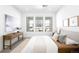 Bright bedroom with large windows, neutral tones, and a cozy aesthetic at 2851 W 52Nd Ave # 304, Denver, CO 80221