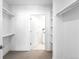 Large walk-in closet with built-in shelving for maximum storage and organization at 2851 W 52Nd Ave # 304, Denver, CO 80221