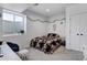 Cozy bedroom features a plush bed and stylish decor, creating a relaxing atmosphere at 10691 County Road 23, Fort Lupton, CO 80621