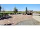Large outdoor patio area with stone pavers and seating, perfect for entertaining guests at 10691 County Road 23, Fort Lupton, CO 80621