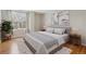 Bright and airy bedroom with a large window and modern decor at 14399 E Grand Dr # 150, Aurora, CO 80015