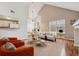 Cozy living room boasts abundant natural light and a seamless open-concept design at 14399 E Grand Dr # 150, Aurora, CO 80015