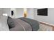 Modern main bedroom with stylish bed, closet access, a mounted TV, and a light-colored rug on wood floors at 14399 E Grand Dr # 150, Aurora, CO 80015