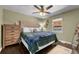 Spacious bedroom with ceiling fan and ample closet space at 4747 Shoshone St, Denver, CO 80211