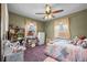 Cozy bedroom with plenty of bookshelves and window light at 4747 Shoshone St, Denver, CO 80211