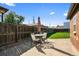 Brick patio with small table and umbrella at 4747 Shoshone St, Denver, CO 80211