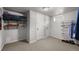 Basement storage room with shelving and closet space at 4747 Shoshone St, Denver, CO 80211