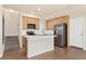 Modern kitchen featuring granite countertops, stainless steel appliances, and ample cabinet space at 10044 Martin Luther King Blvd, Denver, CO 80238