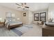 Inviting bedroom with neutral tones, soft carpet, and ample natural light at 10044 Martin Luther King Blvd, Denver, CO 80238