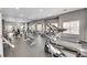 Large gym facility featuring treadmills, elliptical trainers, weights, and other fitness equipment at 15700 E Jamison Dr # 6-201, Englewood, CO 80112