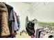 Walk-in closet featuring shelving, clothing, and storage solutions at 15700 E Jamison Dr # 6-201, Englewood, CO 80112