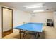 Recreational basement area with a ping pong table, perfect for games and entertainment at 1275 Berea Dr, Boulder, CO 80305