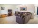 Cozy living room featuring a large sectional sofa and neutral carpet at 1275 Berea Dr, Boulder, CO 80305