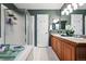Bathroom features double sinks, shower, tub and a spacious layout at 2574 Cove Creek Ct, Highlands Ranch, CO 80129