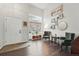 Welcoming entryway with high ceilings, hardwood floors, and an abundance of natural light at 2574 Cove Creek Ct, Highlands Ranch, CO 80129