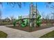 Community playground with slides and play equipment, perfect for families at 2574 Cove Creek Ct, Highlands Ranch, CO 80129