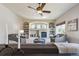 Cozy living room with fireplace, built-in shelving, and comfortable seating at 9636 W 71St Pl, Arvada, CO 80004