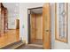 Residential elevator featuring a wood interior and door, adding convenience and accessibility to the home at 2505 Big Bear Cir, Sedalia, CO 80135
