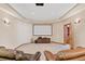 Enjoy movie nights in this home theater with comfortable seating and a large screen at 2505 Big Bear Cir, Sedalia, CO 80135