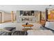 Basement Gathering room featuring a stone fireplace and a built-in bar at 2505 Big Bear Cir, Sedalia, CO 80135