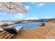 Outdoor pool with a pool cover, surrounded by a deck, and lounge chairs overlooking scenic views at 2505 Big Bear Cir, Sedalia, CO 80135