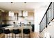Modern kitchen featuring a large island with seating and stainless steel appliances at 2753 Curtis St, Denver, CO 80205