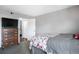 Bedroom with spacious closet and hardwood floors at 3335 S Monaco Pkwy # D, Denver, CO 80222