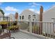 Private deck with flowers and view of complex at 3335 S Monaco Pkwy # D, Denver, CO 80222
