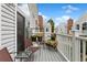 Spacious deck with multiple chairs and planters at 3335 S Monaco Pkwy # D, Denver, CO 80222