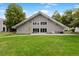 Building exterior with patio and grassy area at 3335 S Monaco Pkwy # D, Denver, CO 80222