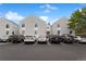 Exterior view of building and parking lot at 3335 S Monaco Pkwy # D, Denver, CO 80222