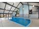 Indoor community pool area with high ceilings at 3335 S Monaco Pkwy # D, Denver, CO 80222