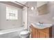 Bathroom with a tiled shower and a modern vanity at 1024 E 14Th Ave # 10, Denver, CO 80218
