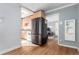 Open kitchen view showcases stainless steel refrigerator and adjacent living area at 1024 E 14Th Ave # 10, Denver, CO 80218