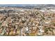 Expansive aerial view of a neighborhood, showcasing the community's layout and proximity to various amenities at 10050 W 8Th Pl, Lakewood, CO 80215