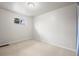 Neutral bedroom with carpet and single window at 10050 W 8Th Pl, Lakewood, CO 80215