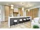 Modern kitchen with an oversized island, bar seating, and high-end stainless steel appliances at 4401 S Clarkson St, Englewood, CO 80113