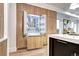 Kitchen with custom built-in refrigerator blending seamlessly with the cabinetry at 4401 S Clarkson St, Englewood, CO 80113