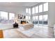 Light-filled primary bedroom with large windows and minimalist decor at 4401 S Clarkson St, Englewood, CO 80113