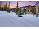 Tranquil image of home in a snowy, wooded area featuring a track, perfect for outdoor winter activities at 327 Peerless Dr, Breckenridge, CO 80424