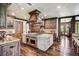 Gourmet kitchen featuring custom cabinets, a large center island, and professional-grade appliances at 327 Peerless Dr, Breckenridge, CO 80424